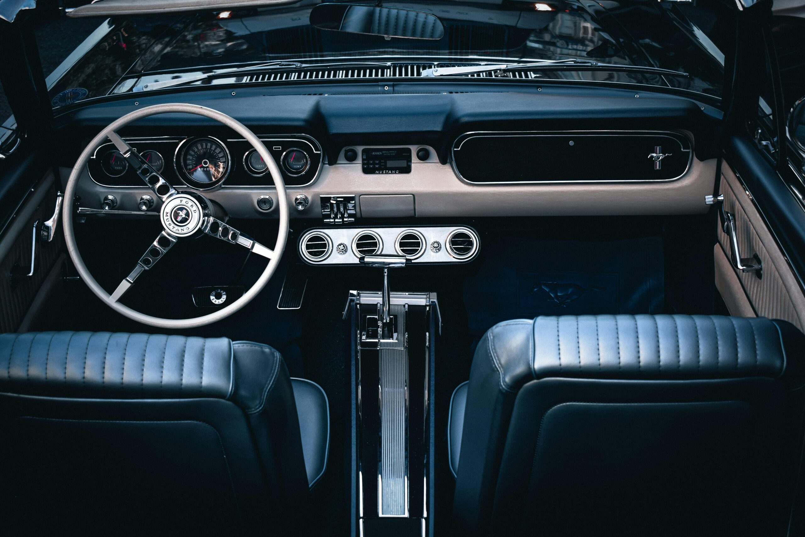 Detailed view of a classic Ford Mustang dashboard in Istanbul, showcasing vintage automotive design.